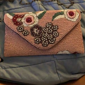 Pink beaded clutch